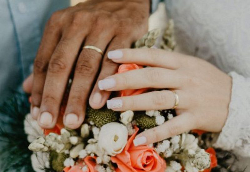 man-and-woman-s-hands-on-top-of-ball-bouquet-1730877